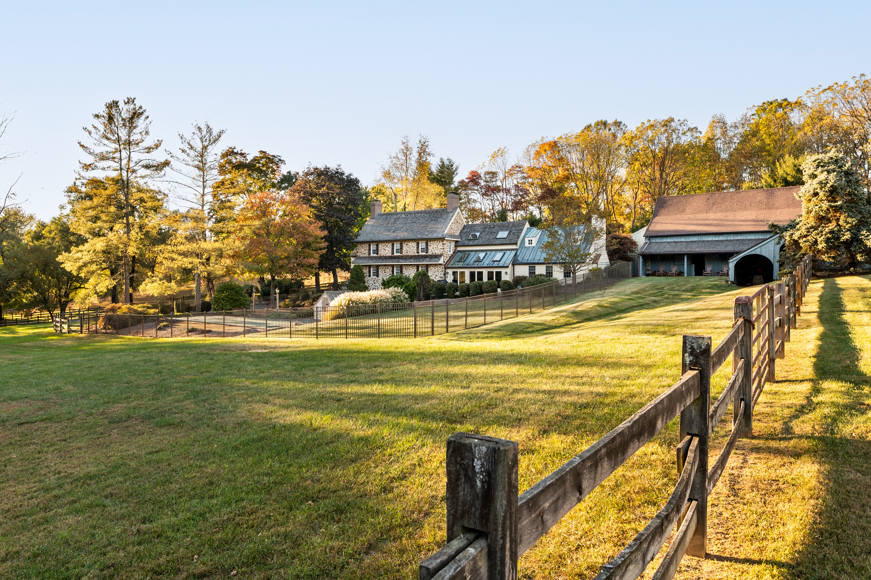 791 Grubbs Mill Road Berwyn, PA 19312 - Photo 51 of 76 a view of swimming pool with outdoor seating and trees in the background