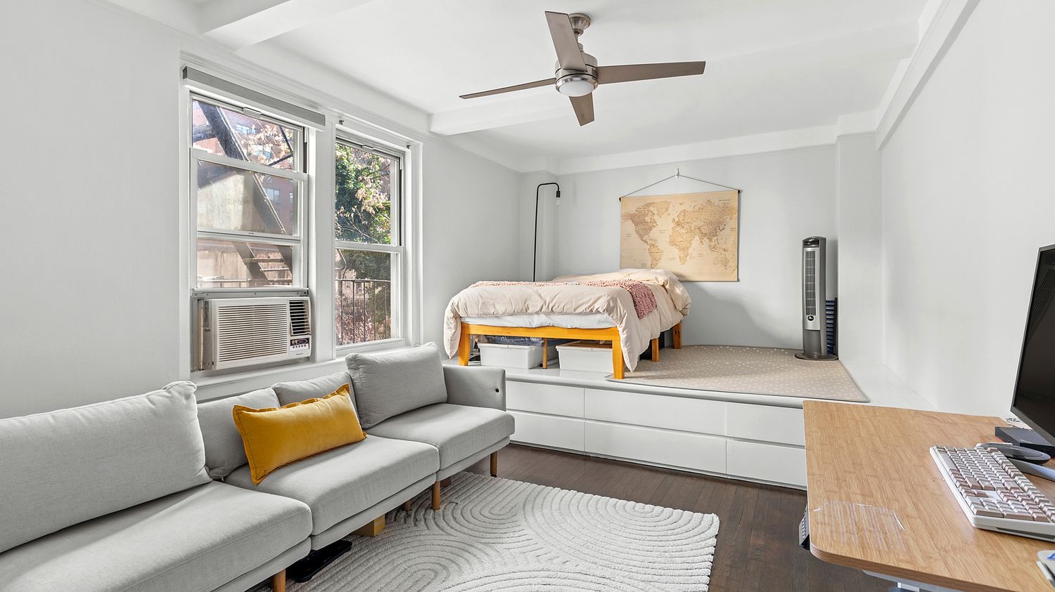 a living room with furniture and a window