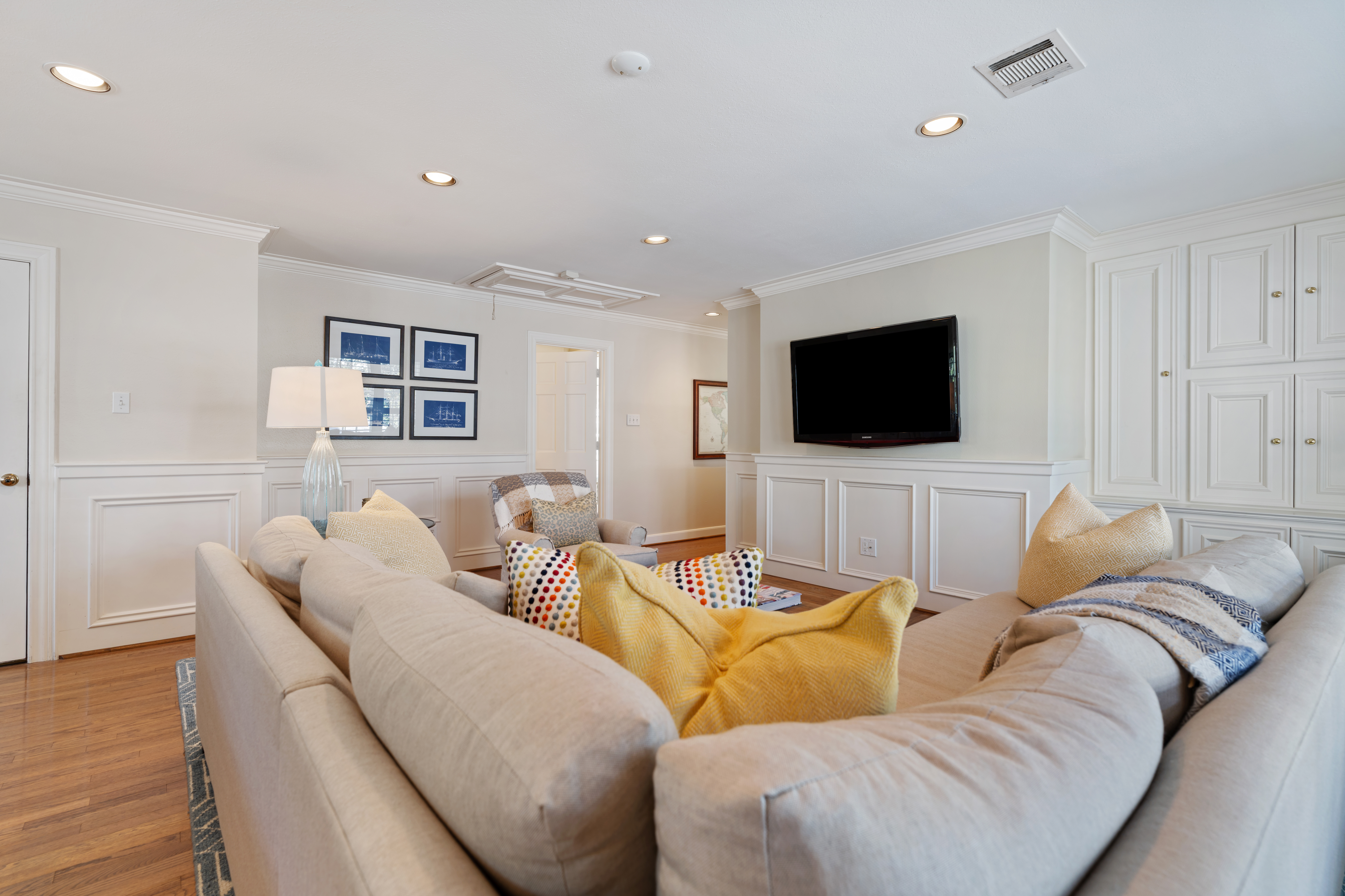 711 Pifer Road Houston, TX 77024 - Photo 32 of 53 a living room with furniture and a flat screen tv