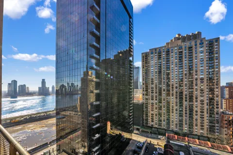 a view of a city with tall buildings