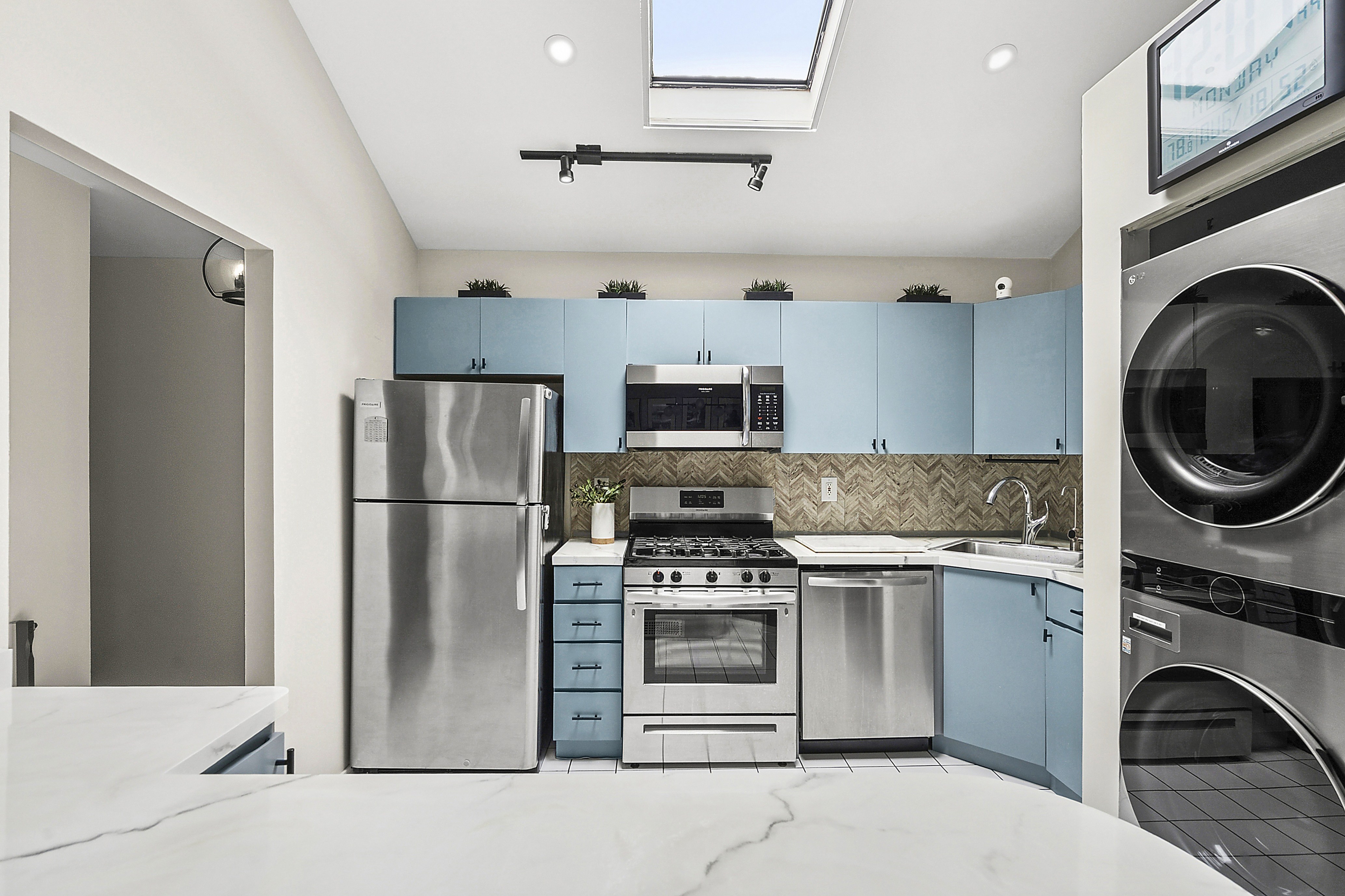 143 Bay Ridge Parkway, Unit 3 Brooklyn, NY 11209 - Photo 10 of 12 a kitchen with a stove top oven and refrigerator
