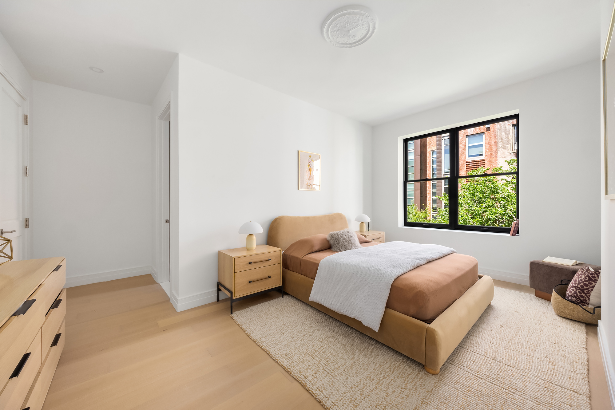 53 West 85th Street Manhattan, NY 10024 - Photo 23 of 37 a bedroom with bed and window