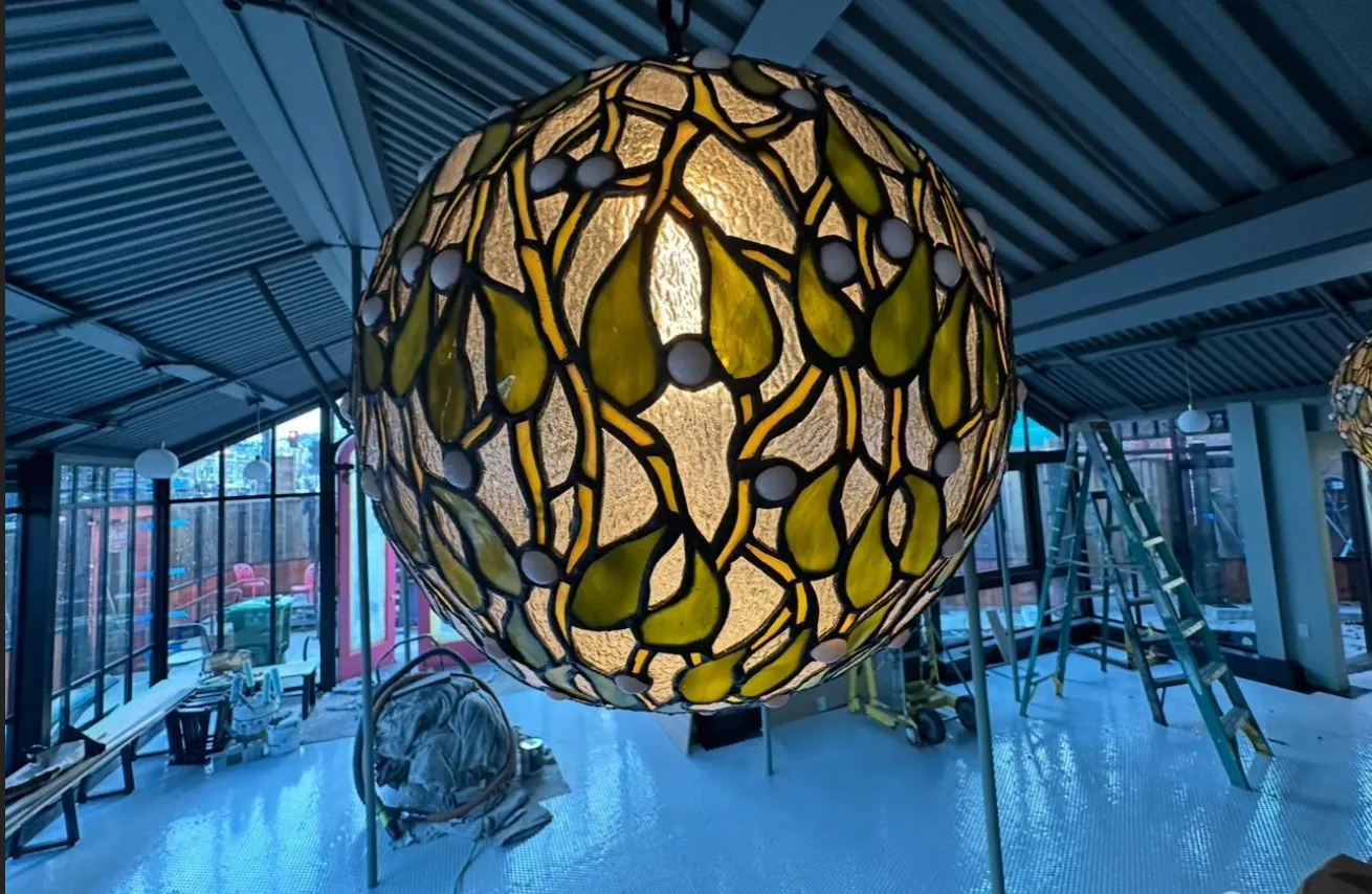 a view of an chairs and table on the wooden floor