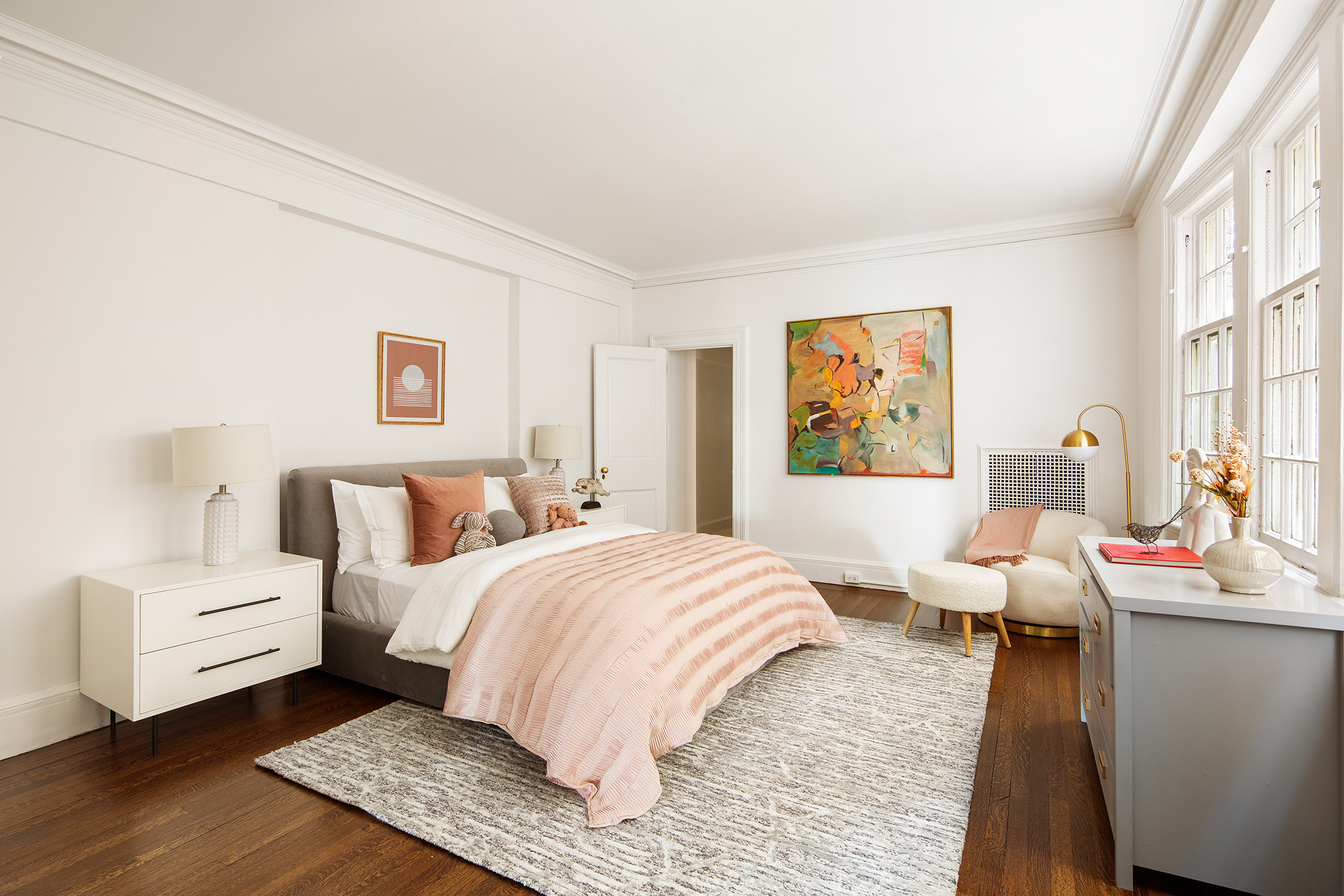 953 5th Avenue, Unit 7/8 Manhattan, NY 10075 - Photo 9 of 15 a bedroom with a bed and wooden floor
