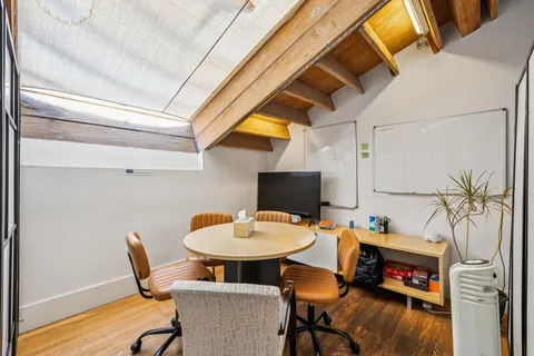 a white refrigerator freezer sitting inside of a kitchen