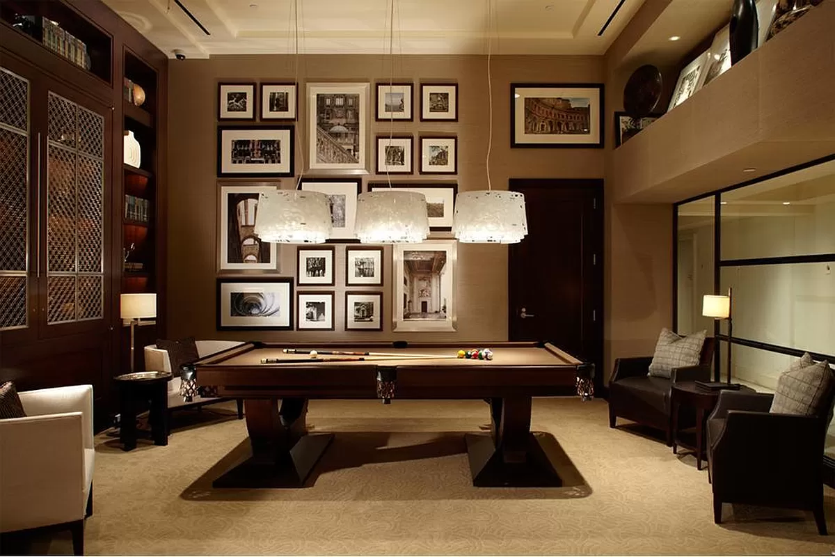 80 Riverside Boulevard, Unit 9E Manhattan, NY 10069 - Photo 13 of 14 a room with furniture pool table and windows