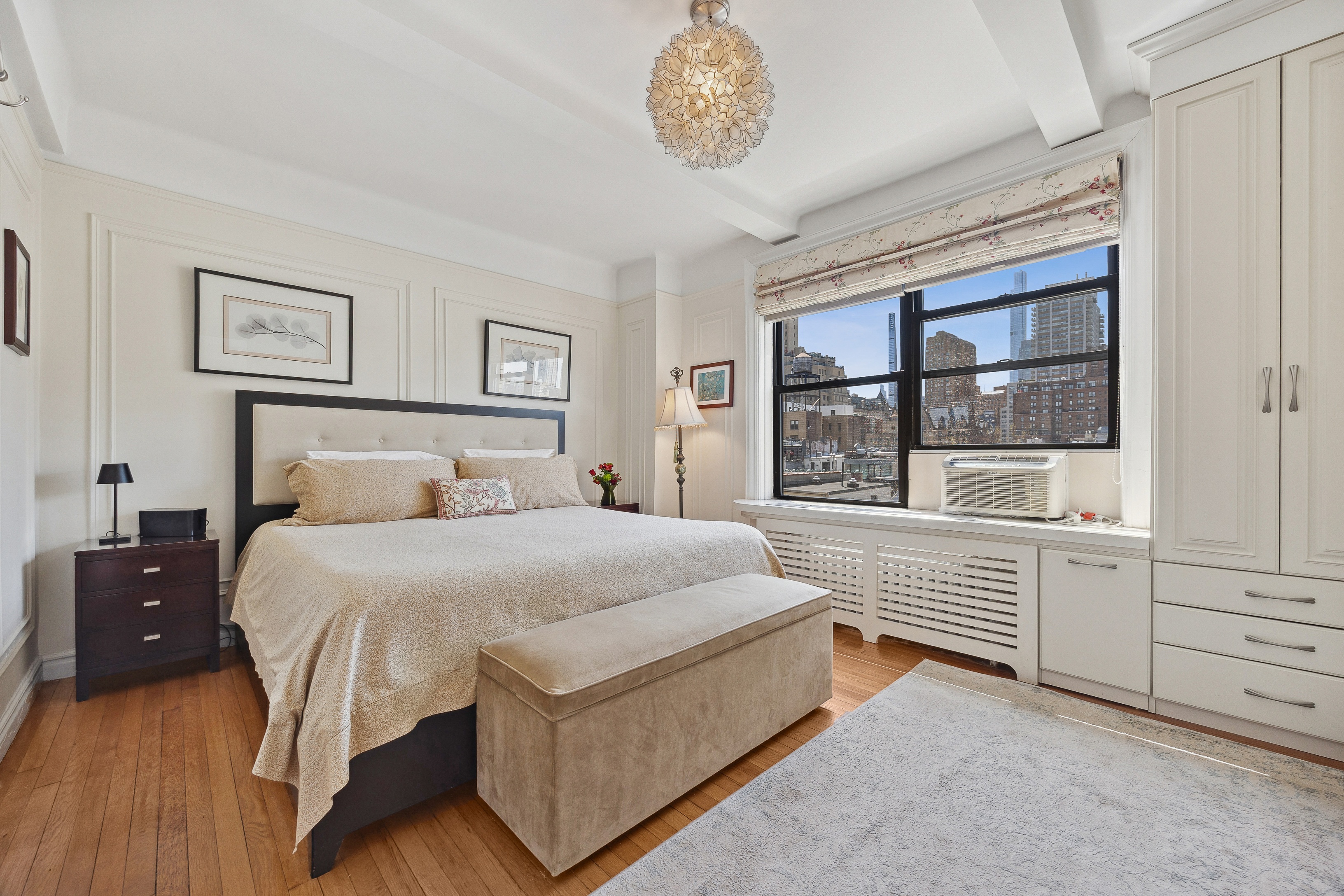 40 West 77th Street, Unit 8C Manhattan, NY 10024 - Photo 10 of 21 a spacious bedroom with a bed and a large window