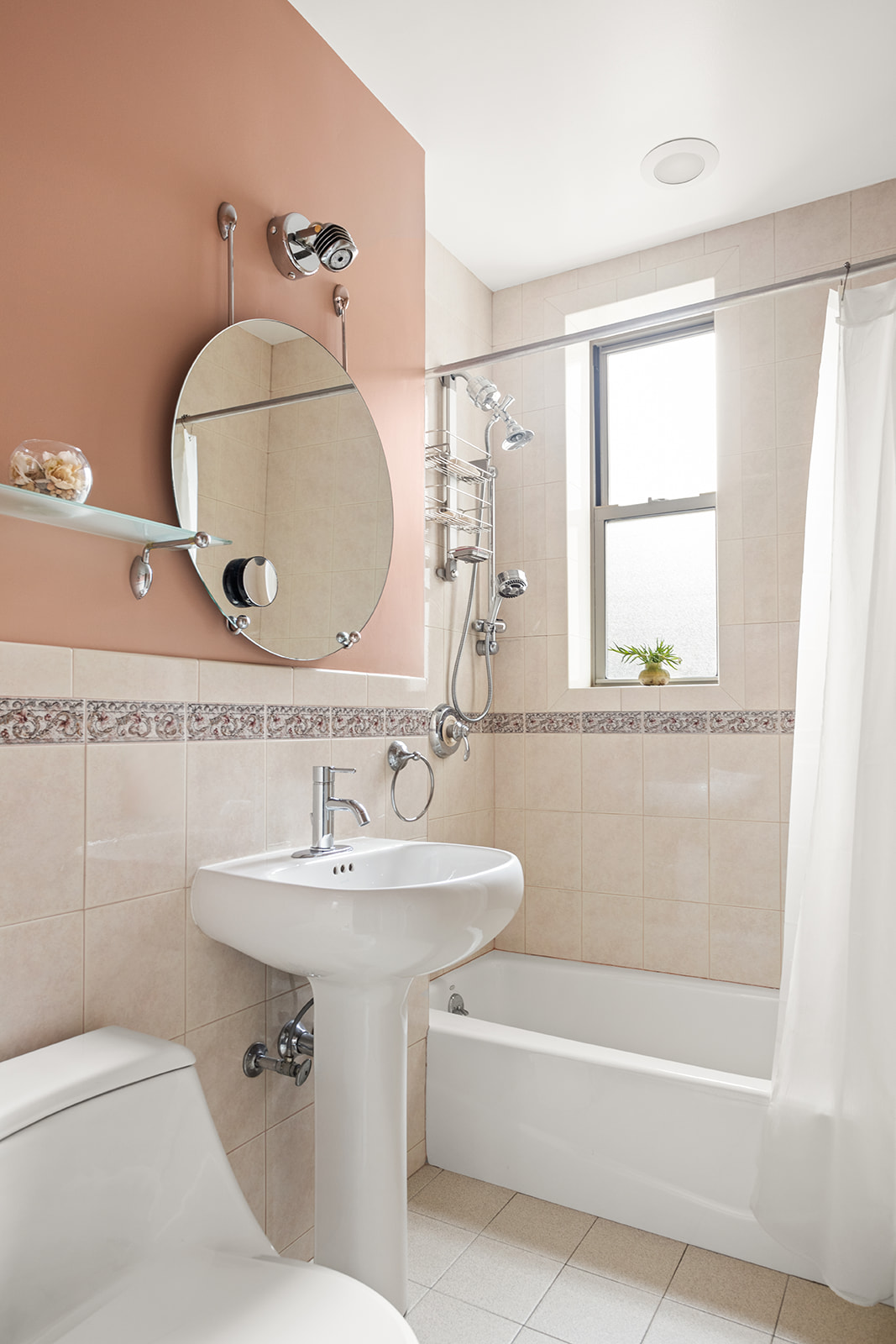 35-56 79th Street, Unit 22 Queens, NY 11372 - Photo 7 of 14 a bathroom with a sink mirror bathtub and toilet