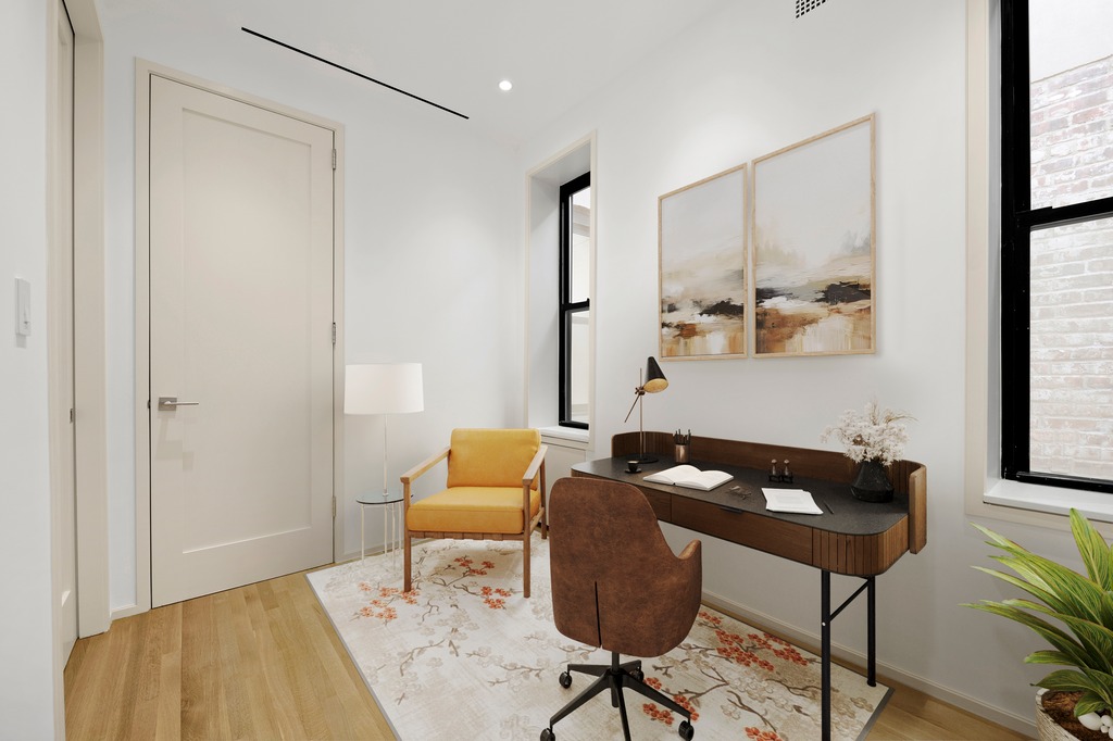 214 Clinton Street, Unit 2E Brooklyn, NY 11201 - Photo 7 of 11 a living room with furniture and a window