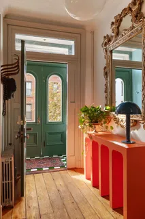 a bathroom with a sink a mirror and vanity