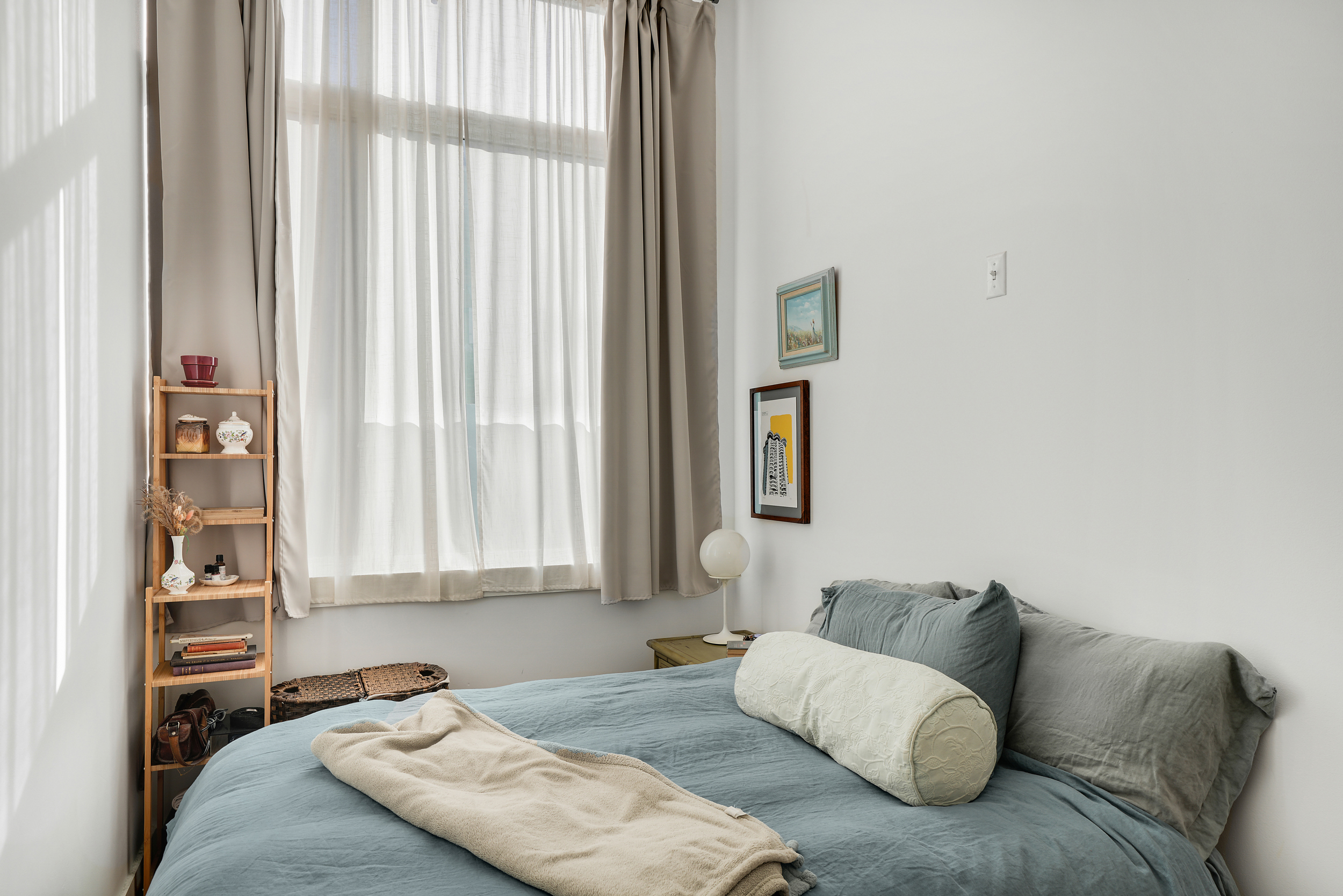 622 Grand Avenue, Unit 102 Brooklyn, NY 11238 - Photo 2 of 13 a living room with furniture and a large window