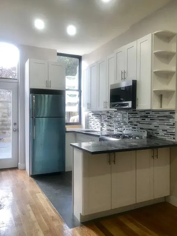 a view of a wooden floor and a lake view