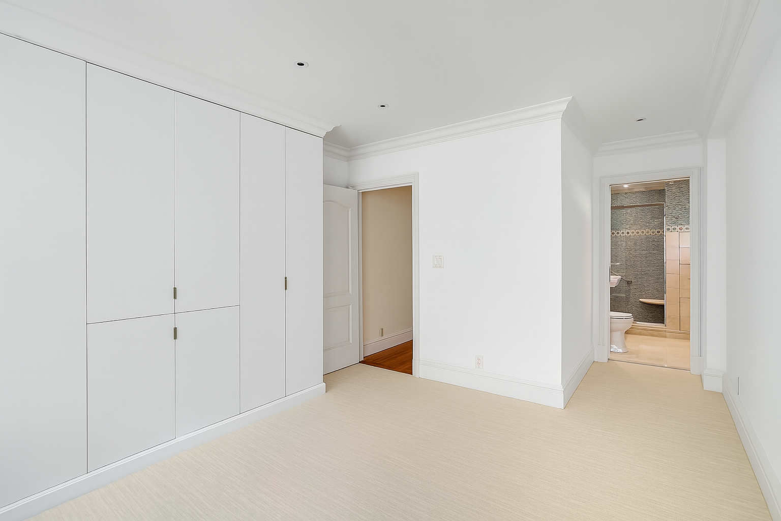 175 East 62nd Street, Unit 8D Manhattan, NY 10065 - Photo 16 of 24 a view of a room with a hallway