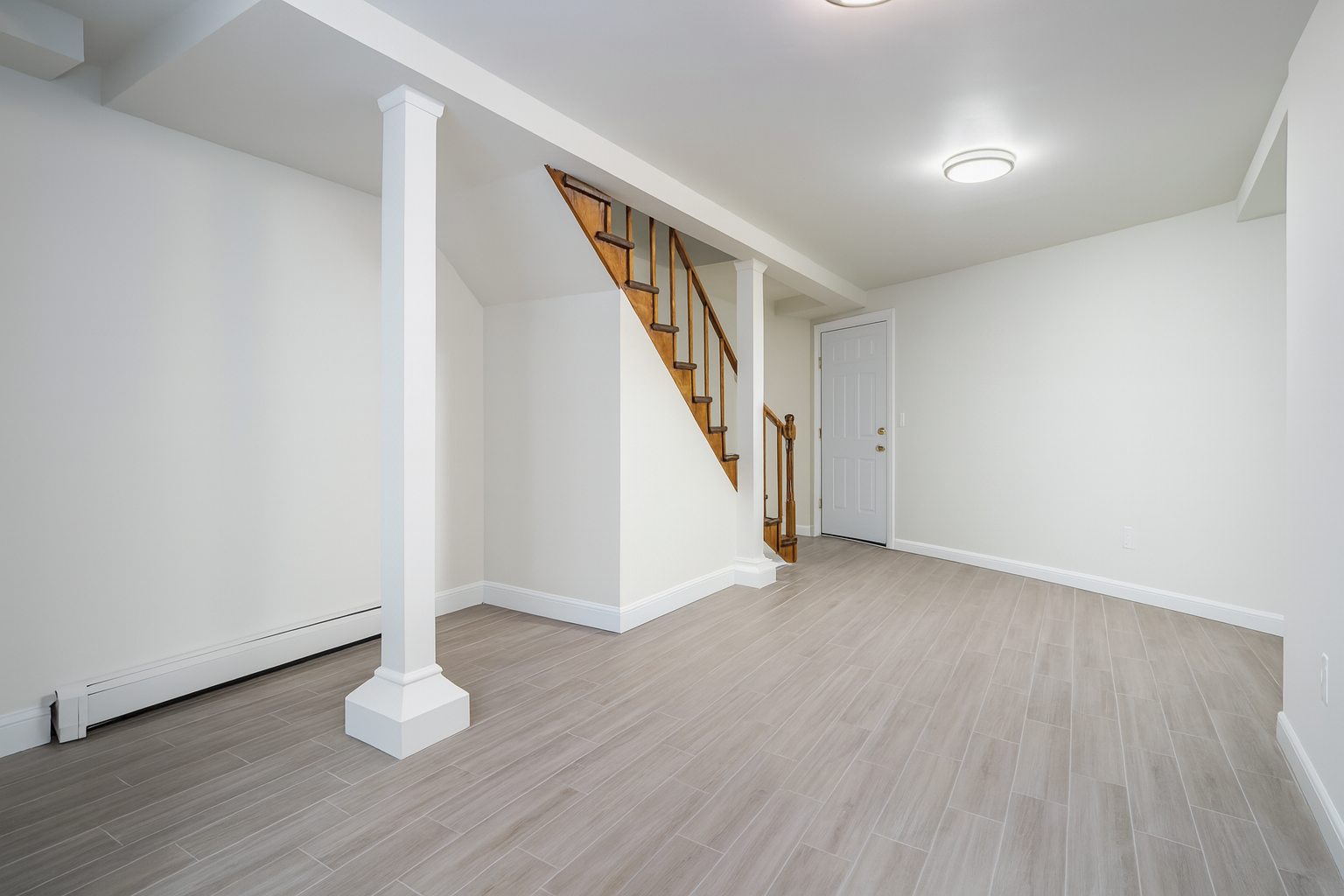 187 Woodpoint Road Brooklyn, NY 11211 - Photo 6 of 17 a view of empty room with wooden floor