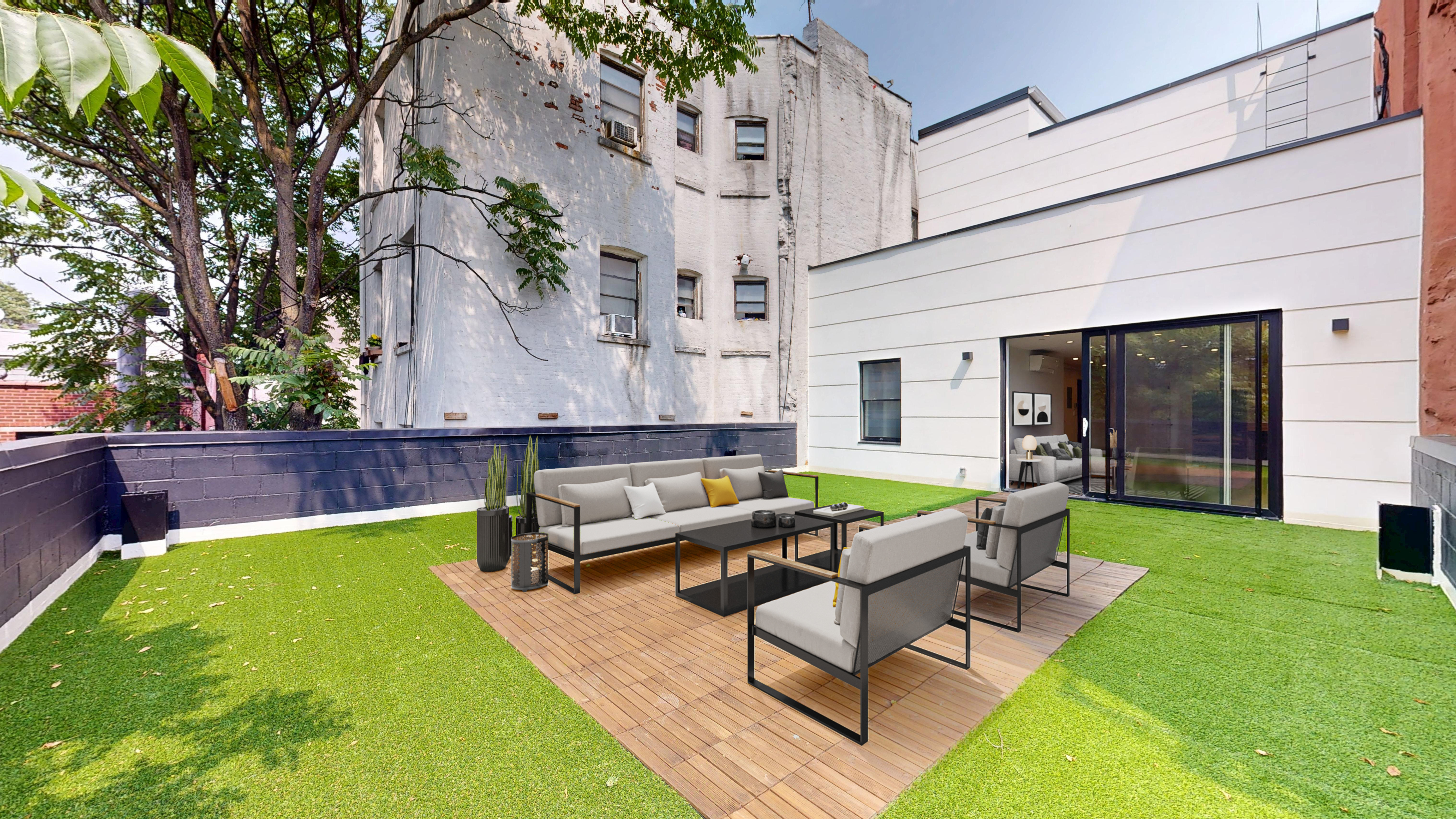 5614 3rd Avenue, Unit 2 Brooklyn, NY 11220 - Photo 2 of 12 a building outdoor space with patio furniture