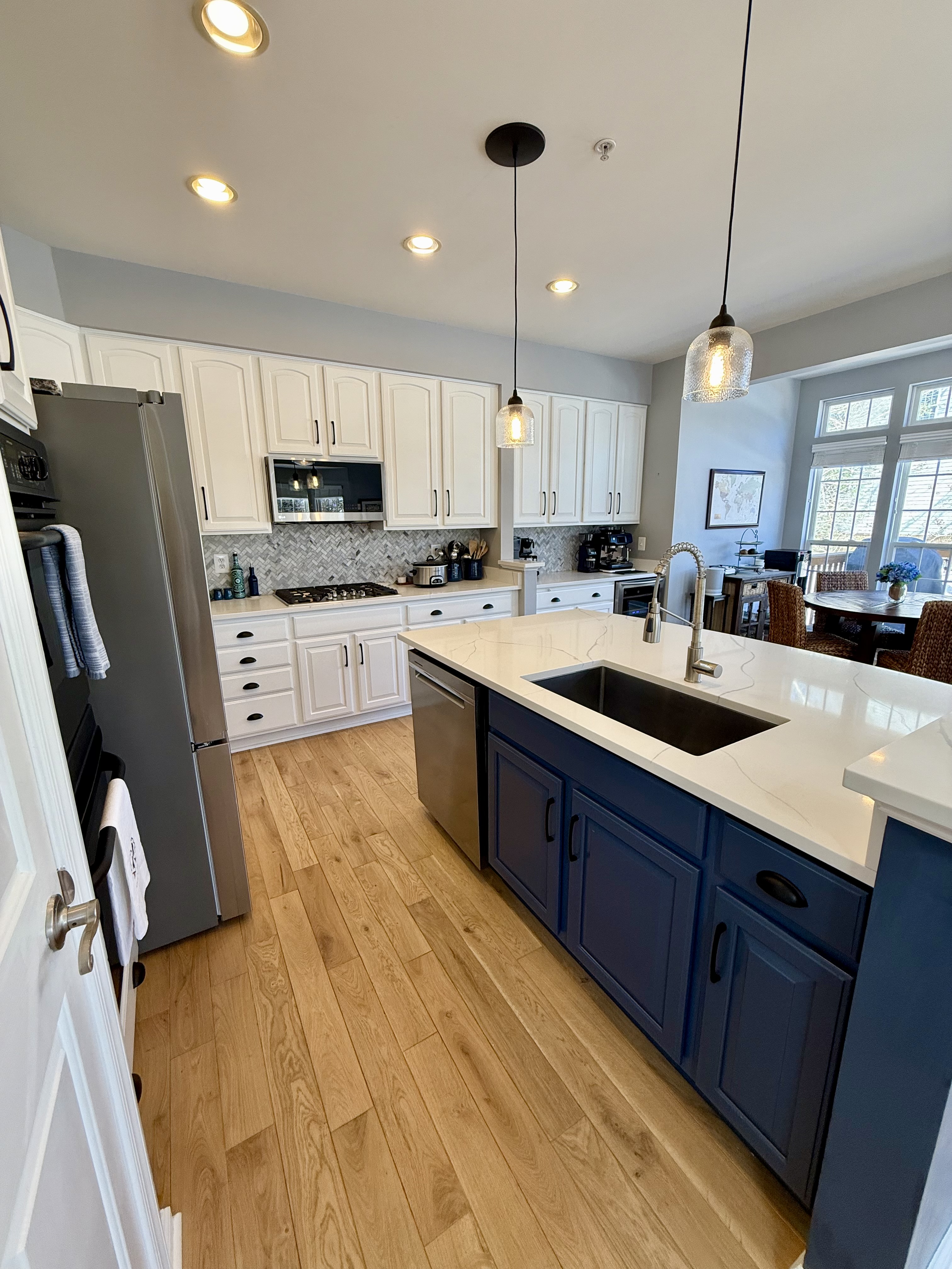 Address Upon Request Leesburg, VA 20176 - Photo 19 of 55 a kitchen with stainless steel appliances granite countertop a sink refrigerator and cabinets