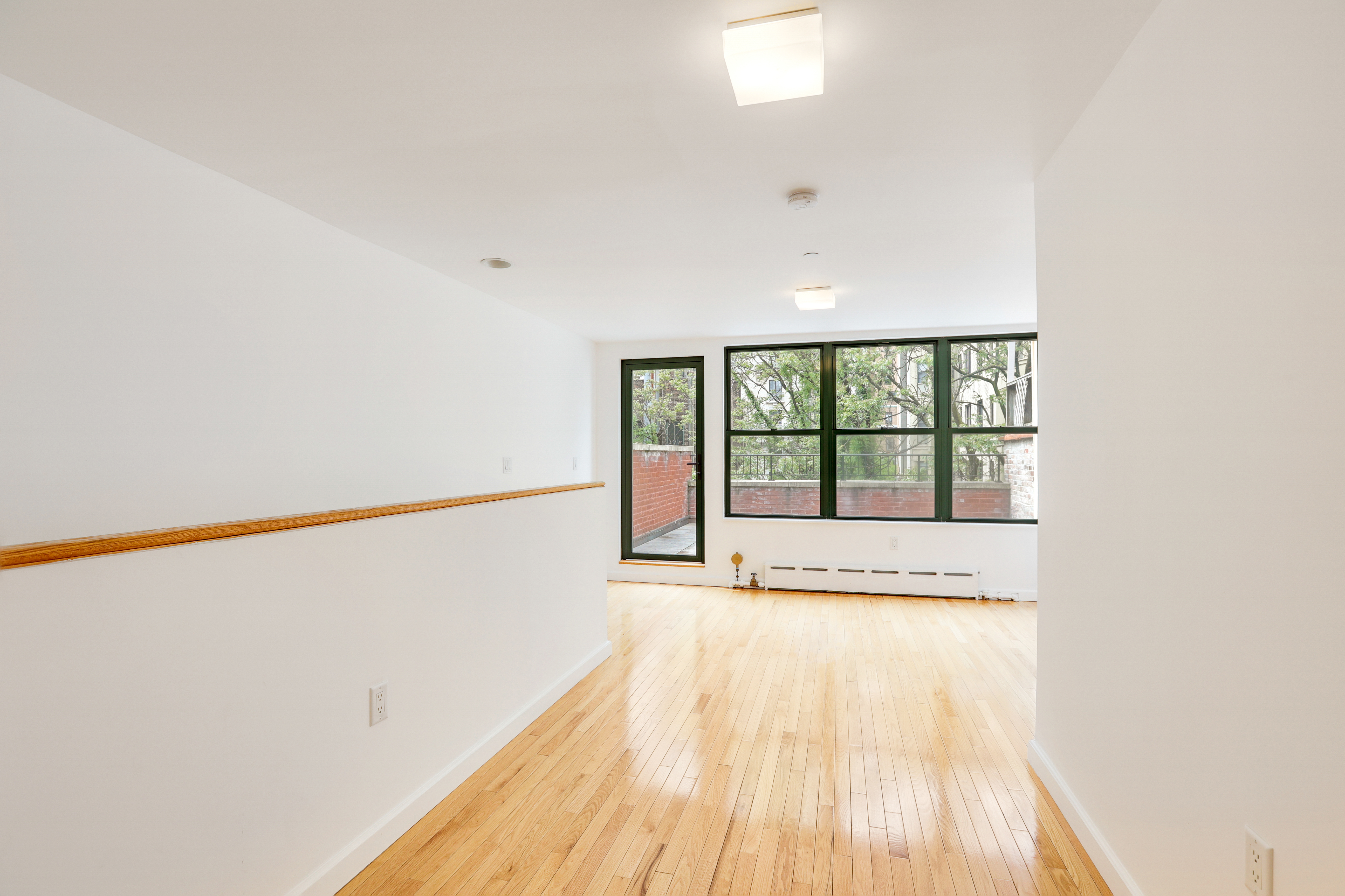230 West 75th Street, Unit 4 Manhattan, NY 10023 - Photo 11 of 16 a view of an empty room