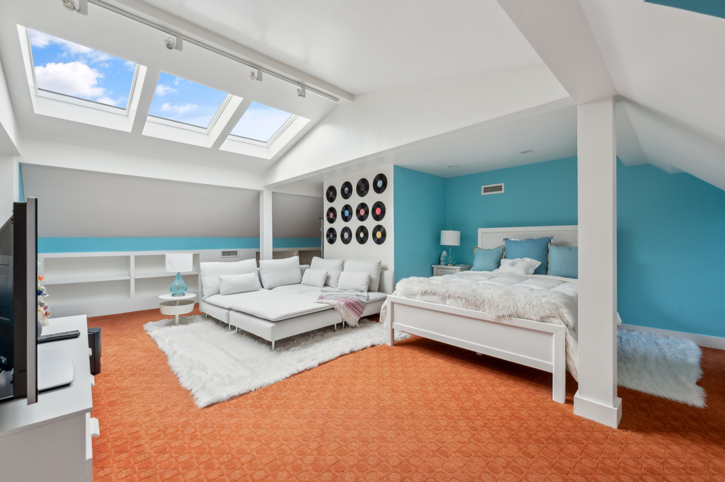 79 Pine Street Dover, MA 02030 - Photo 22 of 25 a bedroom with a large bed and a couch