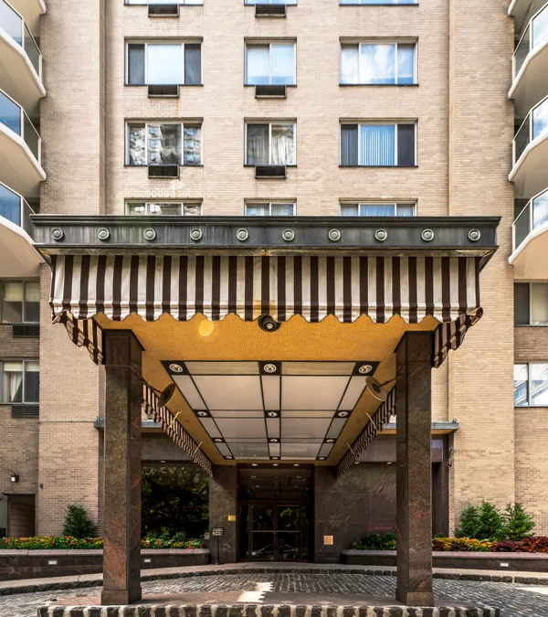 a view of a balcony with furniture