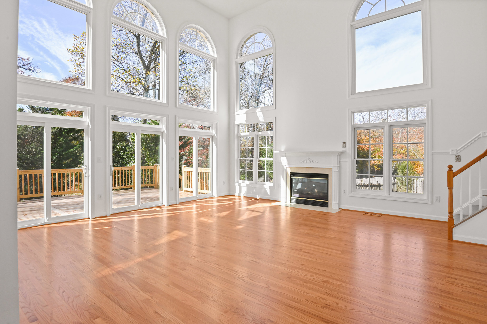 2628 Five Oaks Road Vienna, VA 22181 - Photo 10 of 40 a view of an empty room with wooden floor and a window