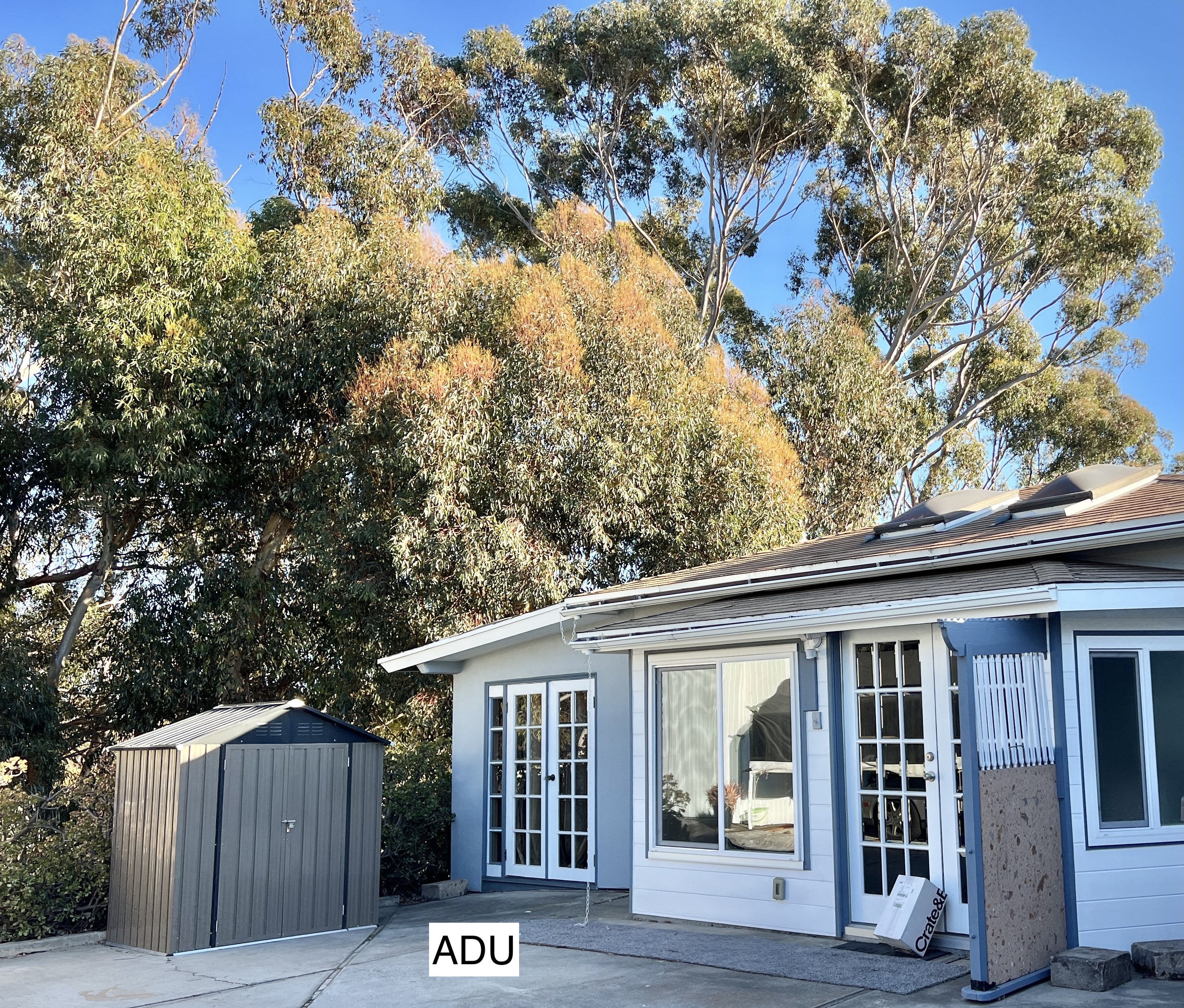 534 Hoover Street Oceanside, CA 92054 - Photo 22 of 31 a view of a house with a small yard and wooden fence