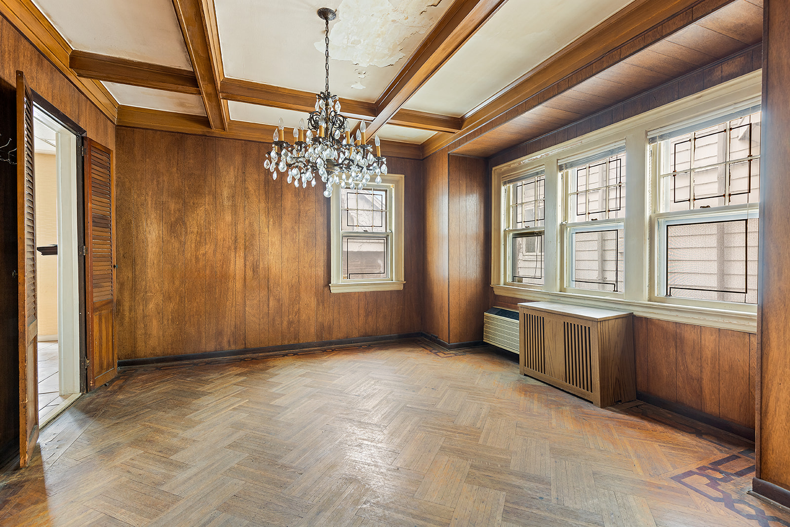 2411 Avenue M Brooklyn, NY 11210 - Photo 4 of 12 a view of an empty room with a window