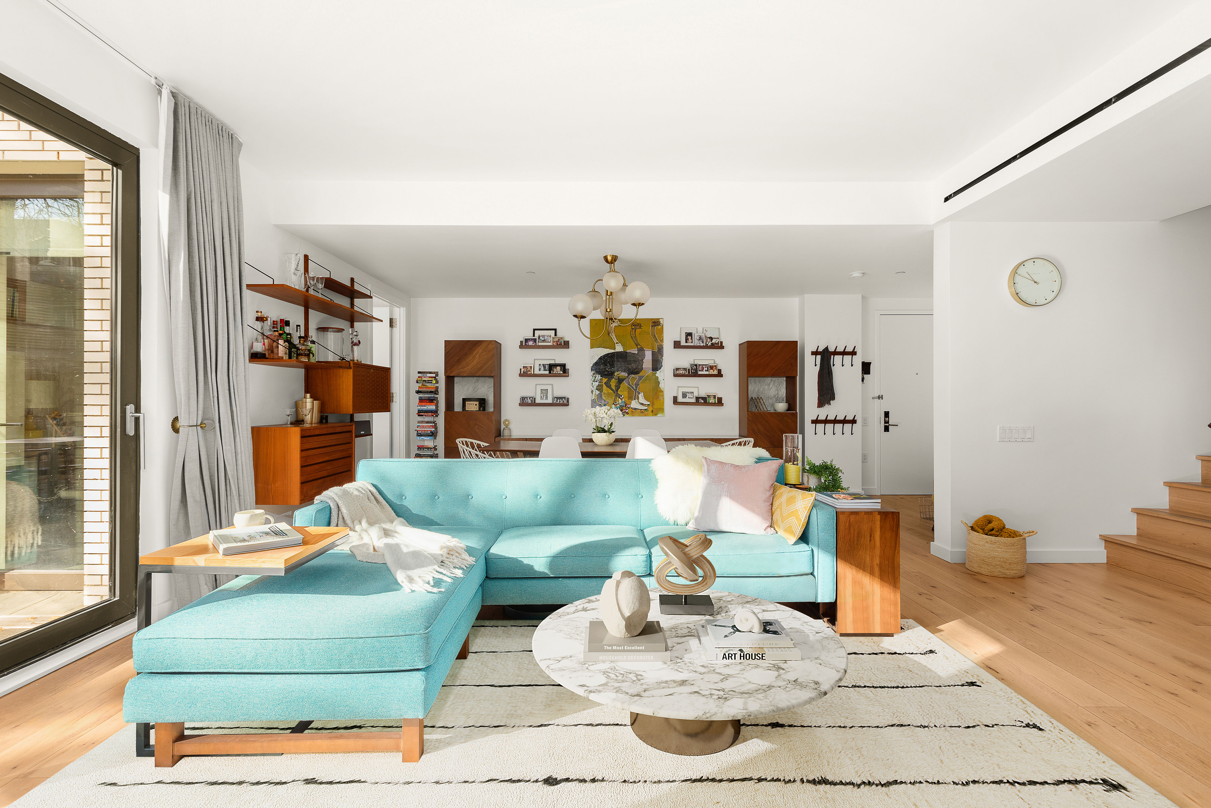 280 Saint Marks Avenue, Unit TH-E Brooklyn, NY 11238 - Photo 3 of 10 a living room with furniture and a table