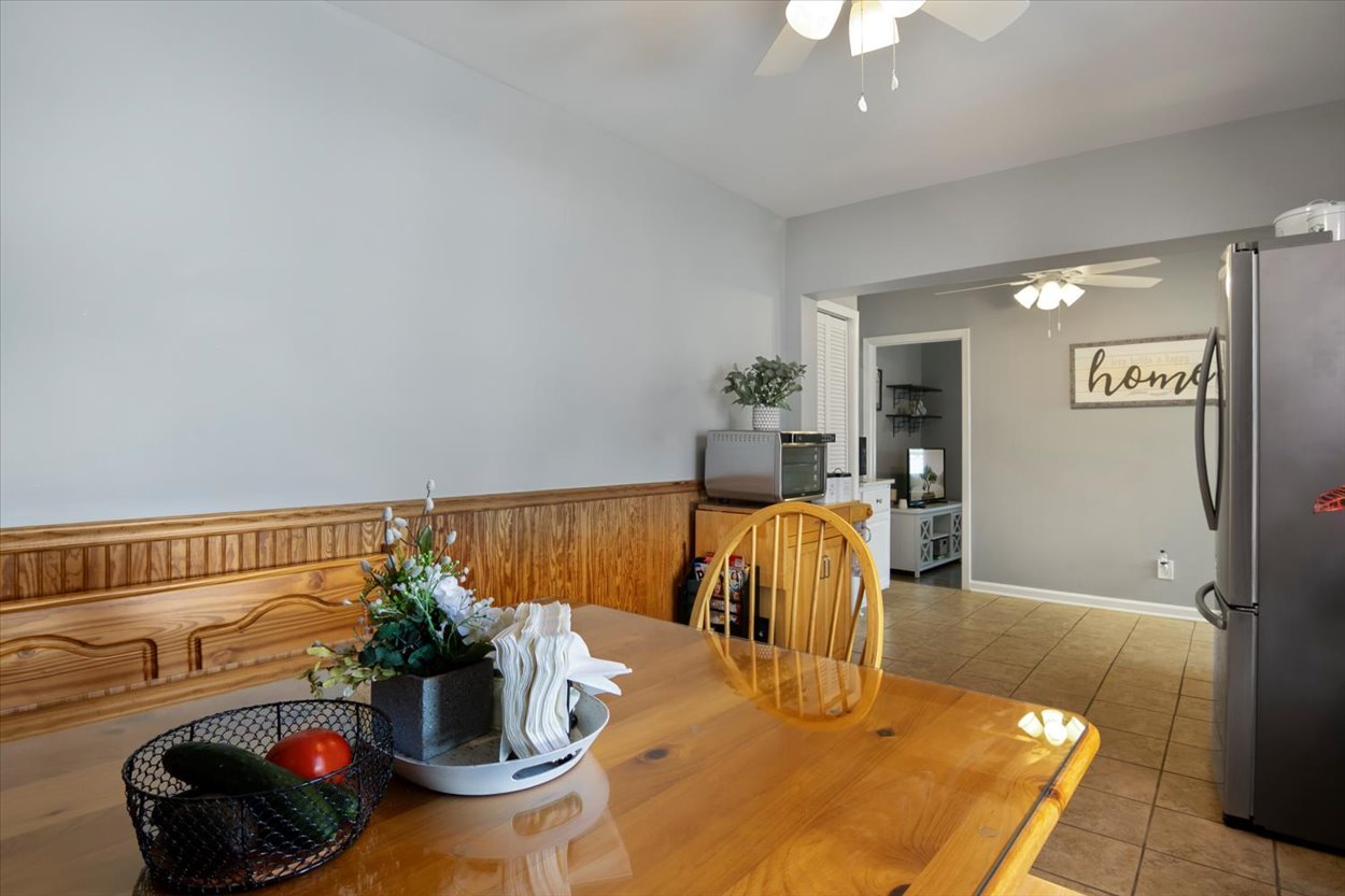 107 Kingston Road Parsippany, NJ 07054 - Photo 24 of 43 a dining room with furniture and wooden floor