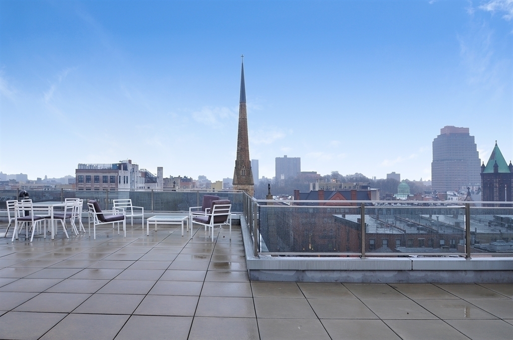 117 West 123rd Street, Unit 4B Manhattan, NY 10027 - Photo 14 of 16 a view of outdoor space with city view