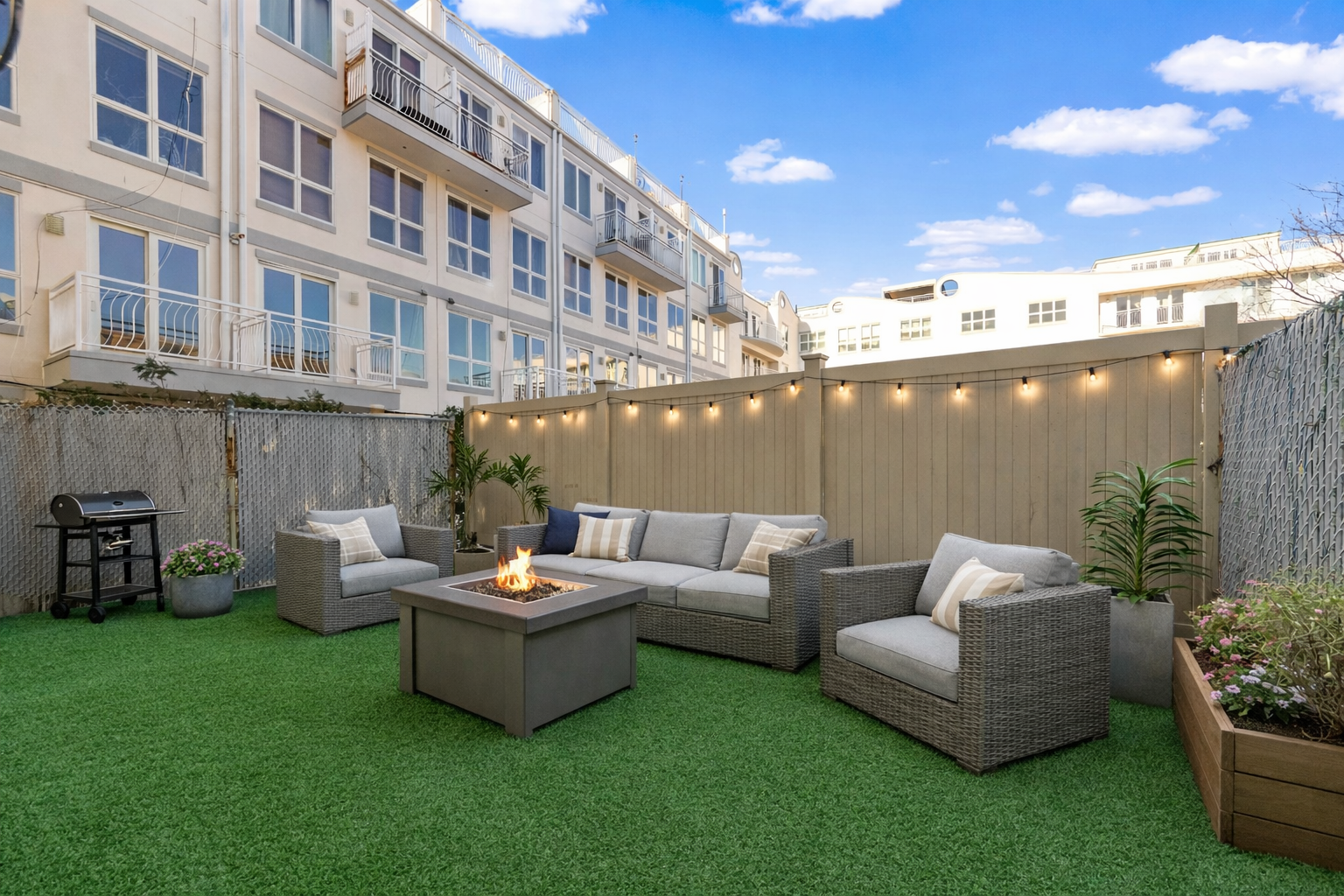 3112 Emmons Avenue, Unit 3132-1 Brooklyn, NY 11235 - Photo 6 of 12 a outdoor living space with furniture and garden view