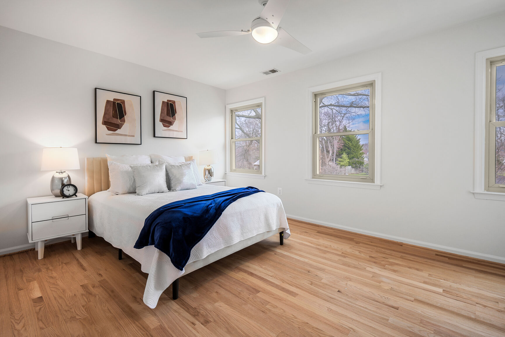 4008 Evangeline Terrace Olney, MD 20832 - Photo 33 of 54 a bedroom with a bed and a painting on the wall