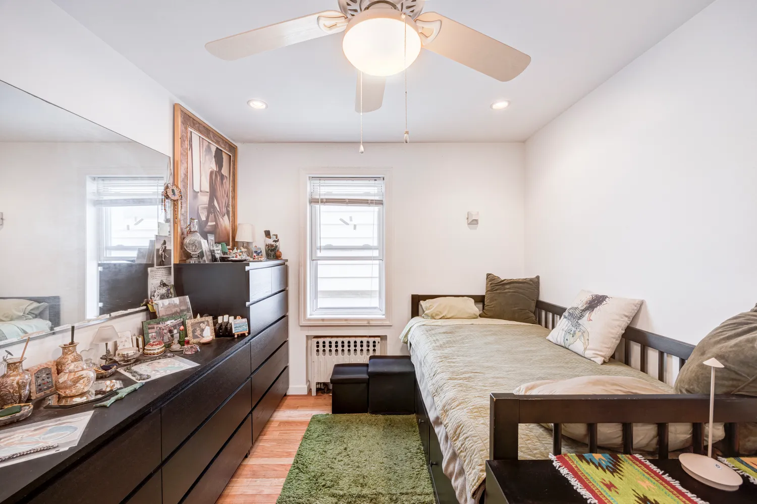 a bed room with a bed and furniture