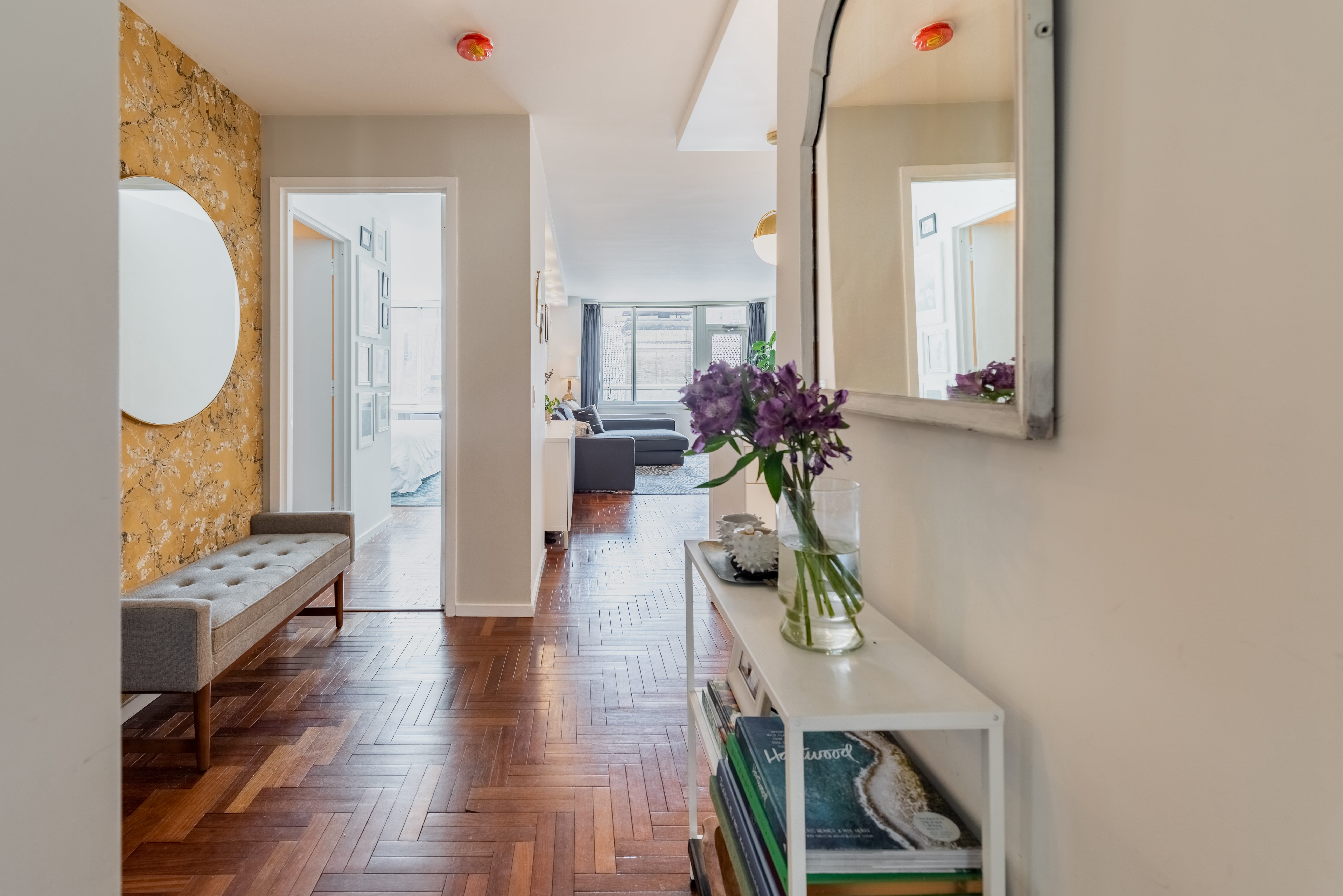 2373 Broadway, Unit 630 Manhattan, NY 10024 - Photo 3 of 17 a view of living room filled with furniture and wooden floor