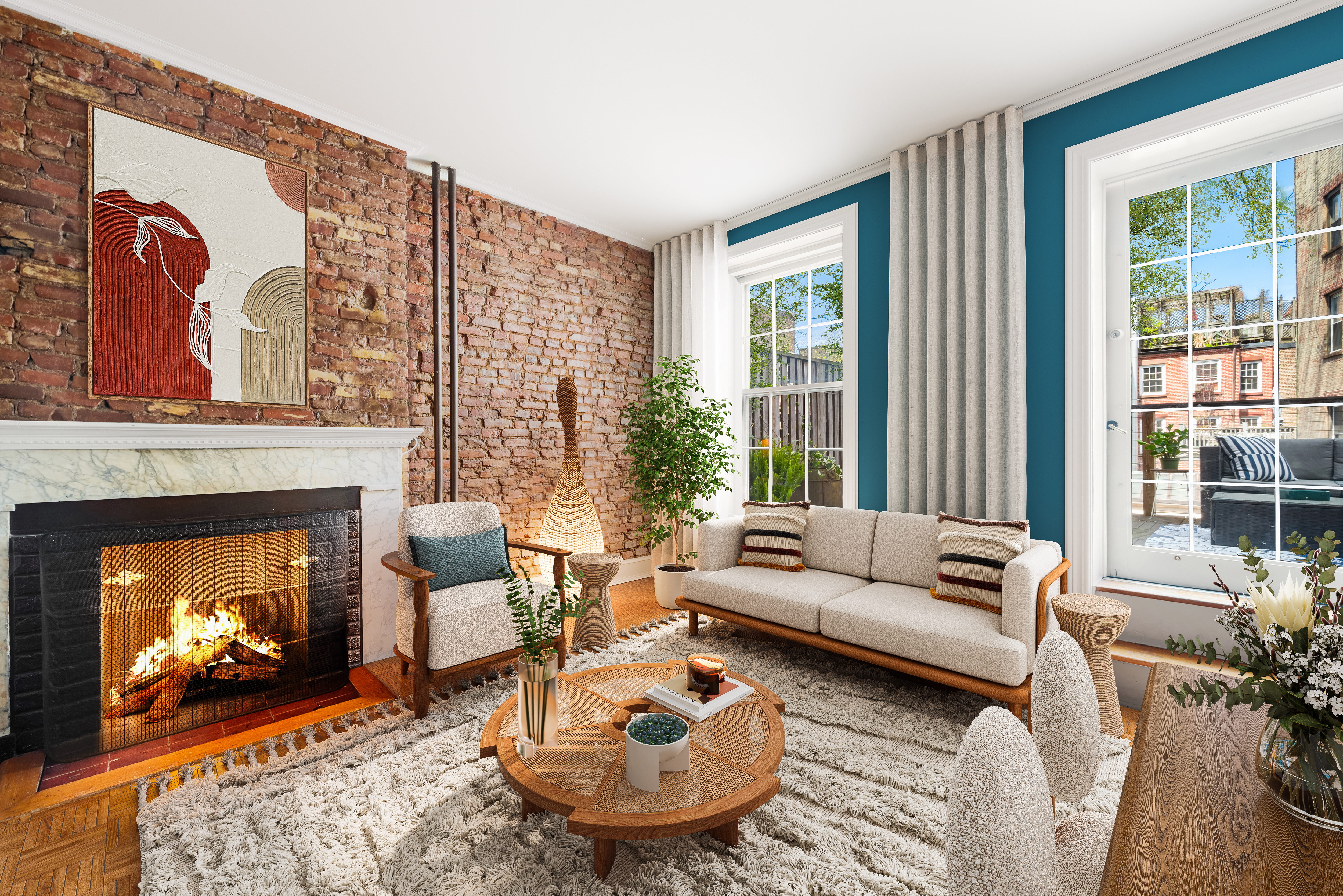 5 Charles Street, Unit 3R Manhattan, NY 10014 - Photo 2 of 14 a living room with furniture and a fireplace