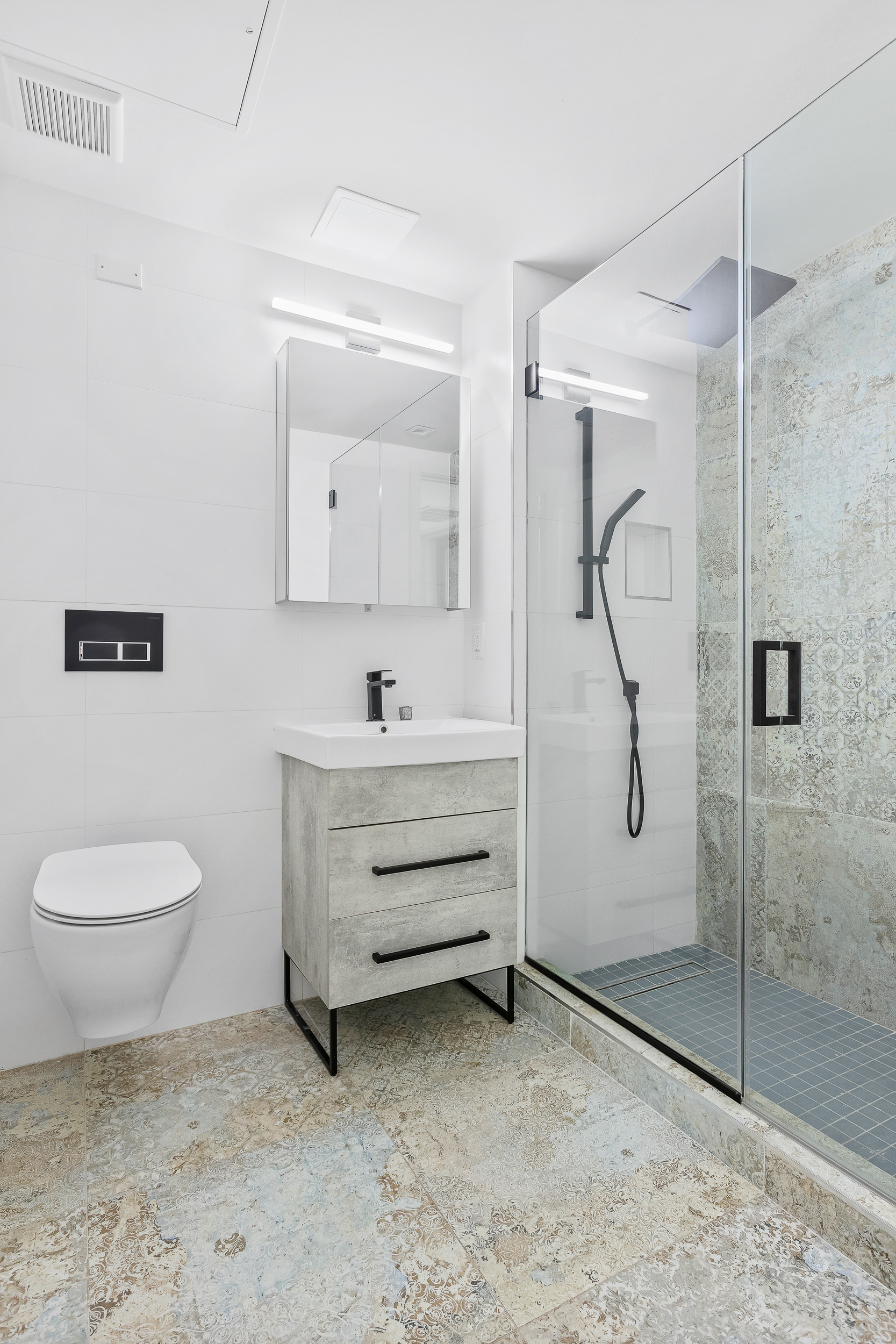 44 Box Street, Unit 2R Brooklyn, NY 11222 - Photo 5 of 9 a bathroom with a toilet sink and shower