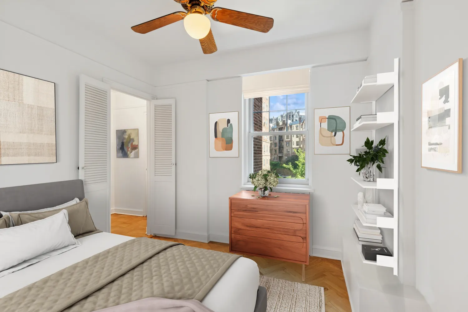 a bedroom with a bed chandelier and a window