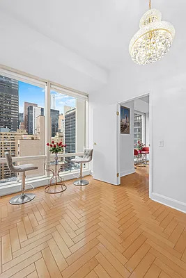 845 United Nations Plaza, Unit 56E Manhattan, NY 10017 - Photo 4 of 28 a view of a livingroom with seating area