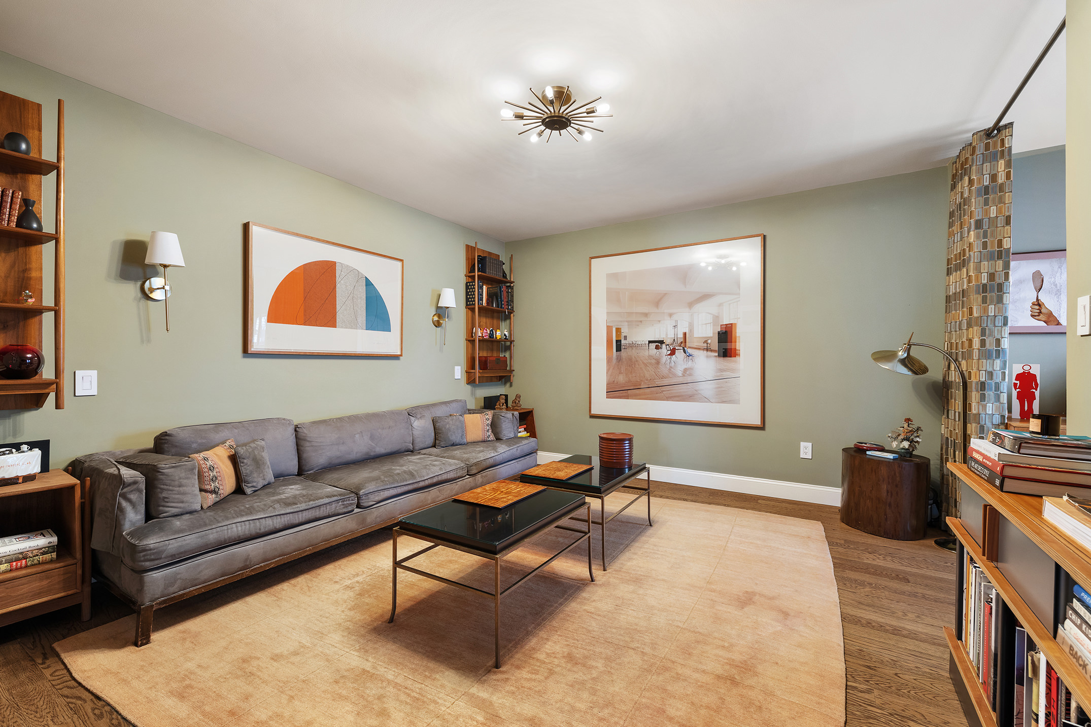 23 Park Avenue, Unit 1A Manhattan, NY 10016 - Photo 6 of 18 a living room with furniture a rug and a window