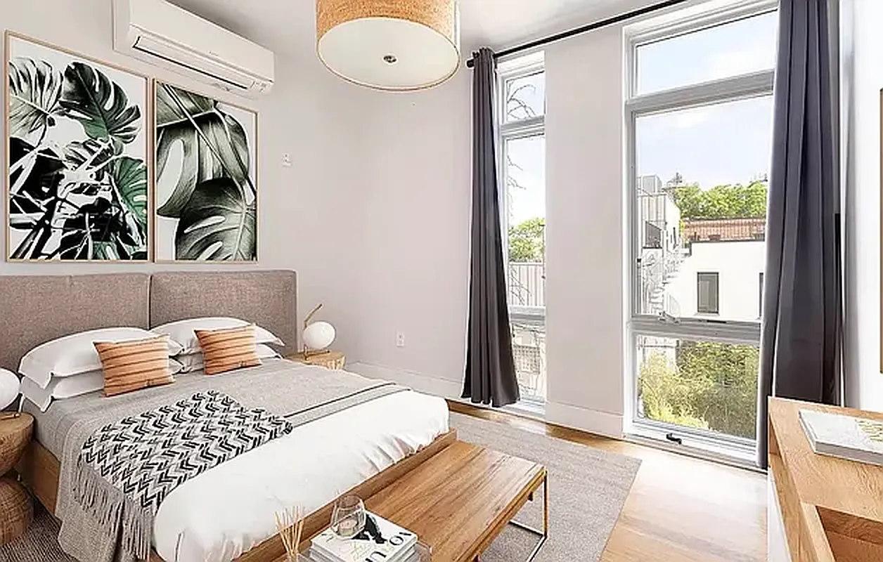 47 Withers Street, Unit 2R Brooklyn, NY 11211 - Photo 4 of 5 a bedroom with a bed and a window