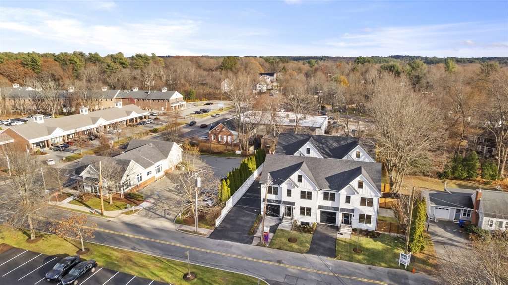 10 Webber Avenue, Unit 3C Bedford, MA 01730 - Photo 27 of 36 a view of a large building with a mountain