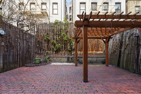 a front view of a building with street view