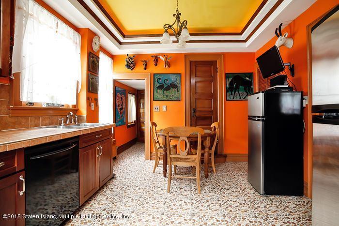 630 East 24th Street Brooklyn, NY 11210 - Photo 14 of 28 a dining room with a table and chairs