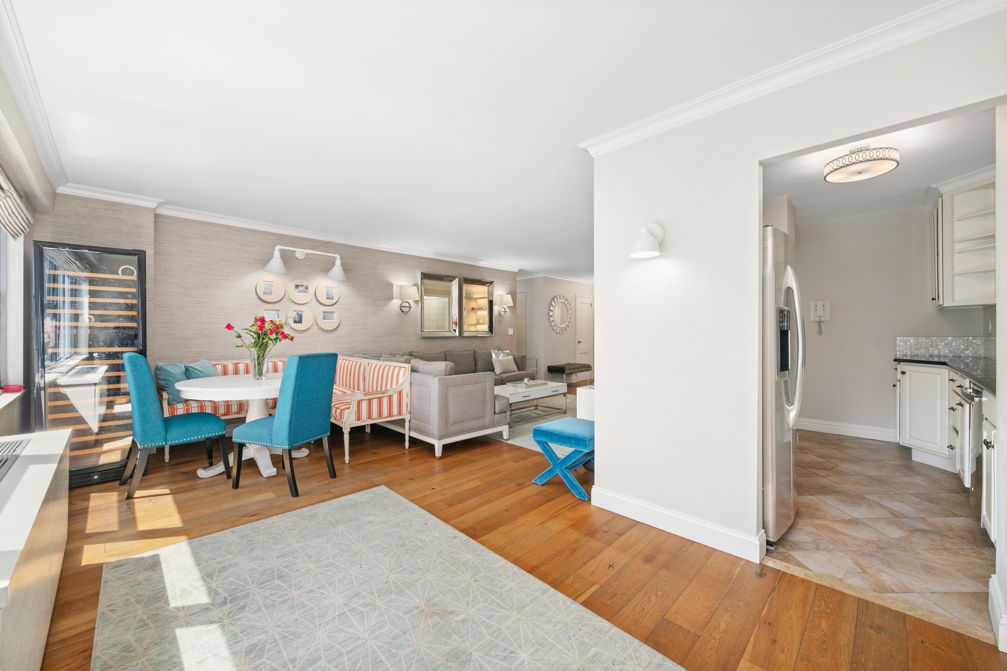 10 West 15th Street, Unit 1027/1028 Manhattan, NY 10011 - Photo 3 of 15 a living room with furniture and a table