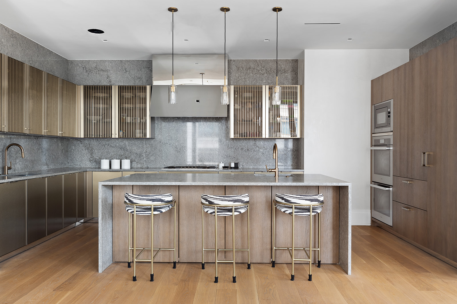 601 Washington Street, Unit 3W Manhattan, NY 10014 - Photo 4 of 15 a kitchen with stainless steel appliances granite countertop a sink a stove and a refrigerator