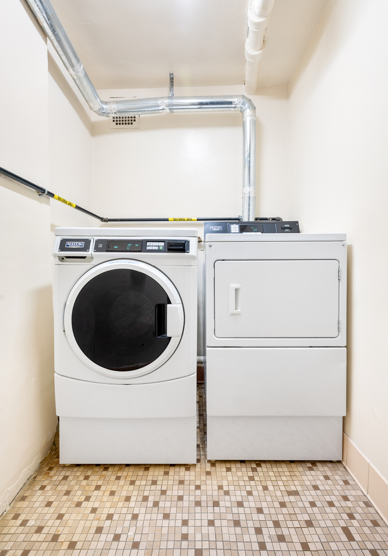 35-20 Leverich Street, Unit B226 Queens, NY 11372 - Photo 14 of 15 a utility room with a washer and dryer