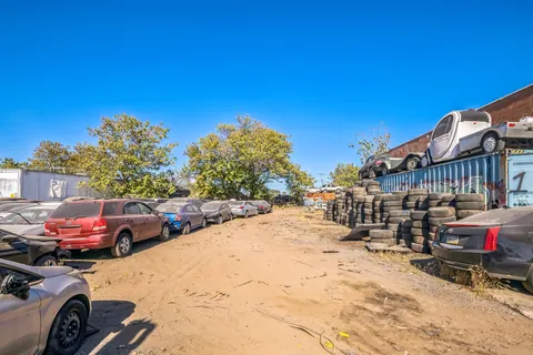 a view of a street with cars