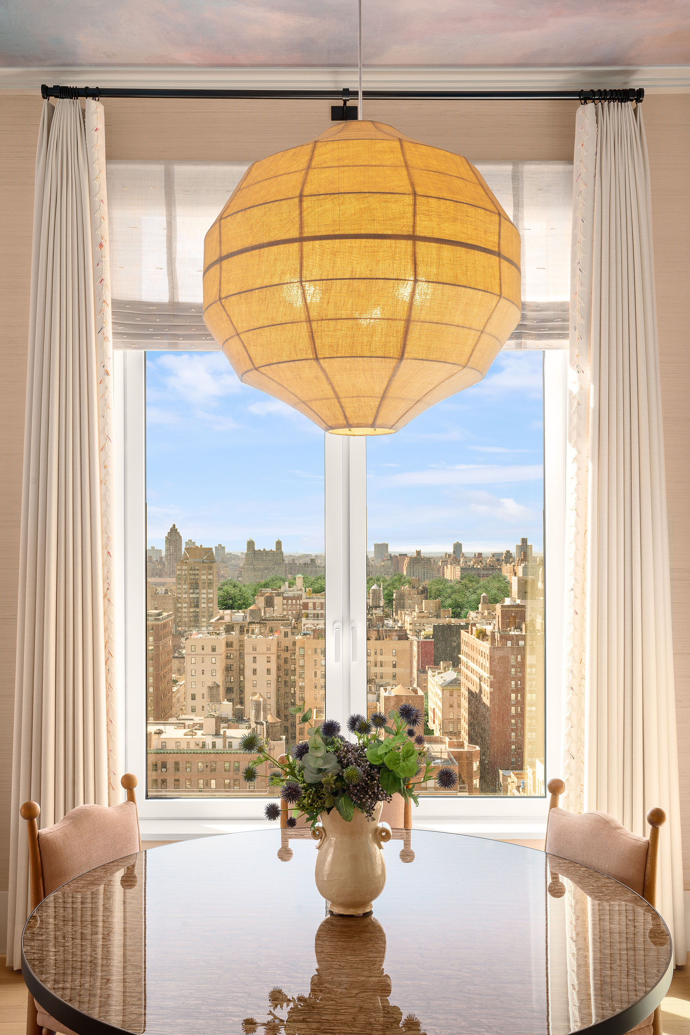 200 East 83rd Street, Unit 24C Manhattan, NY 10028 - Photo 6 of 35 a living room with furniture and a window