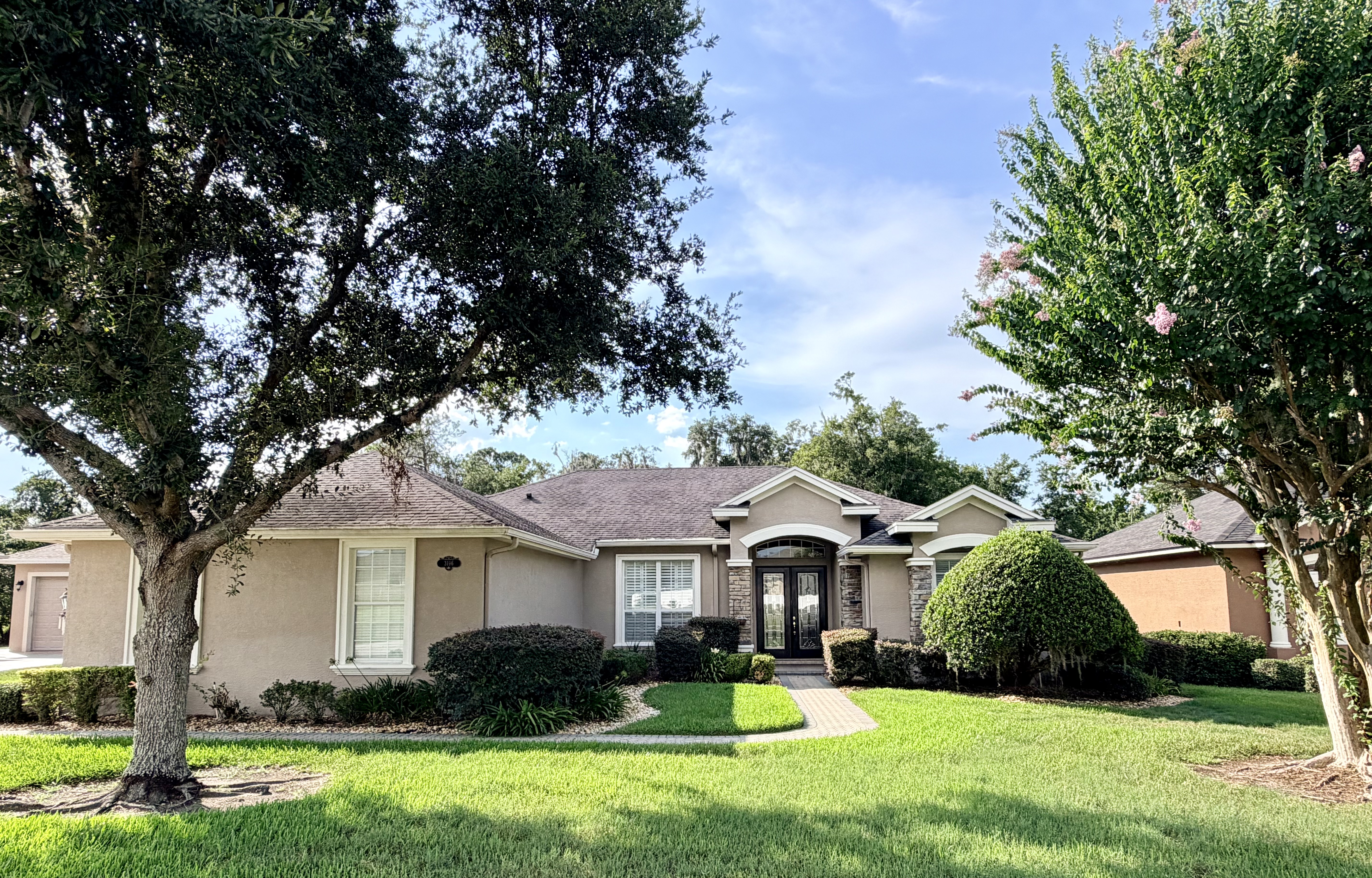 3196 Hawks Ridge Drive Lakeland, FL 33810 - Photo 1 of 14 a front view of house with yard and green space