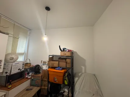 a room with furniture and a mirror