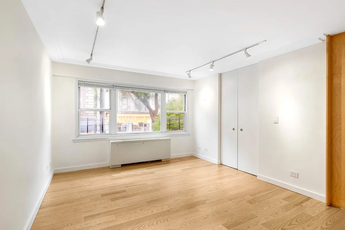 333 East 66th Street, Unit 2FE Manhattan, NY 10065 - Photo 10 of 19 a view of an empty room with a window
